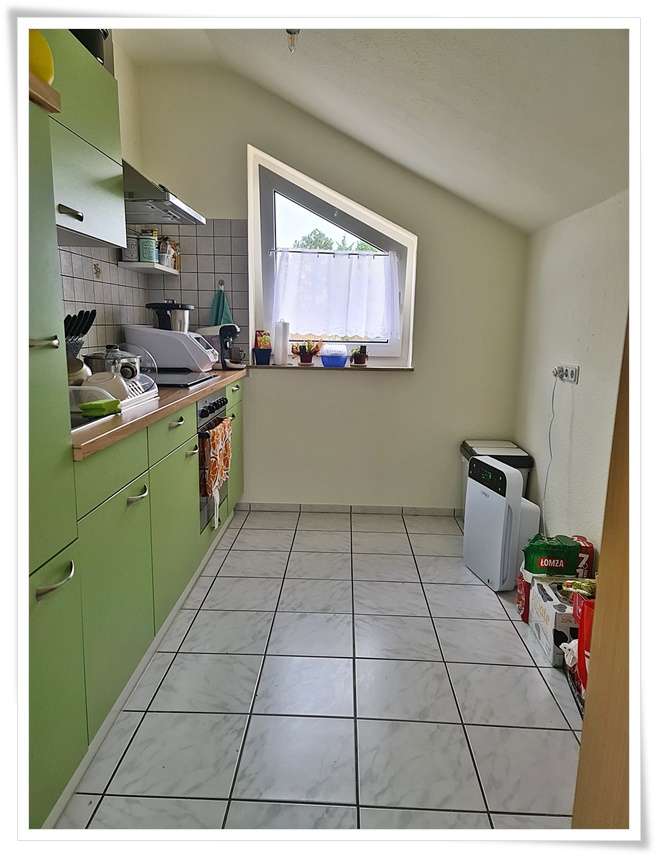 Kapitalanleger gesucht+Vermietete 2 Zi. DG Wohnung inkl. Kellerraum und PKW Stellplatz zu verkaufen