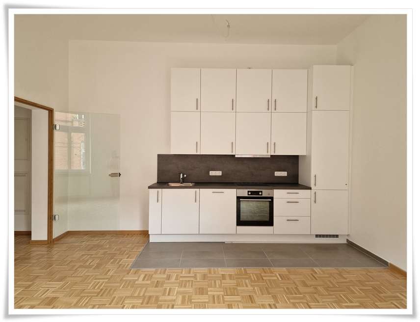 Erstbezug nach Umbau*** Helle 2 Zi. Etagenwohnung inkl. EBK in zentraler Innenstadt Lage