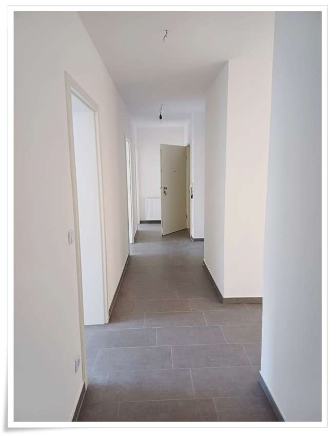 Erstbezug nach Kernsanierung 4 Zi.- Souterrain-Whg. -Ruhige Wohnlage-