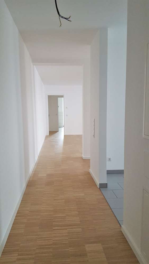 Exklusiver Wohntraum! Lichtdurchflutete 3 Zi. Neubau Whg. 2 Bädern, EBK,WineBank und TG-Stellpl u.v.